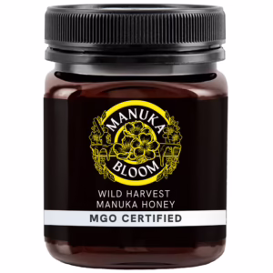 Manuka Bloom Australian Manuka honey 100+ MGO amber jar front view with premium label