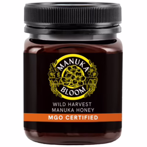 Manuka Bloom Australian Manuka honey 100+ MGO Creamed amber jar front view with premium label