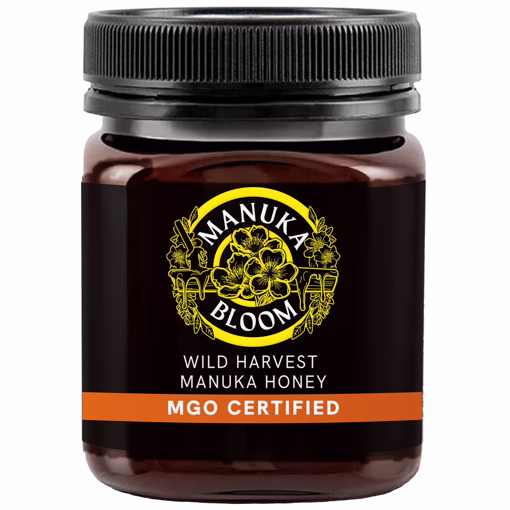 Manuka Bloom Australian Manuka honey 100+ MGO Creamed amber jar front view with premium label
